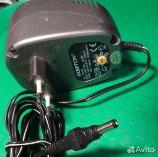 Блок питания Универс Robiton 3-12В 0.9А бу DN1000