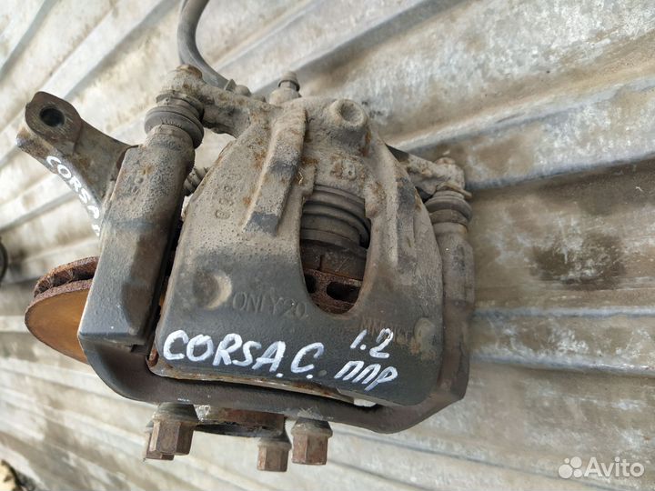 Суппорт передний Opel Corsa C