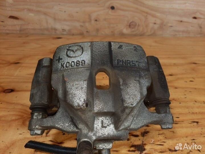 Суппорт передний левый Mazda Atenza GJ2FW shvptr