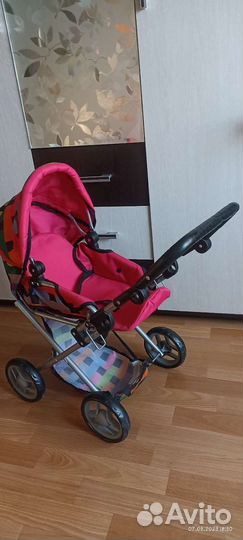 Детская игрушечная коляска