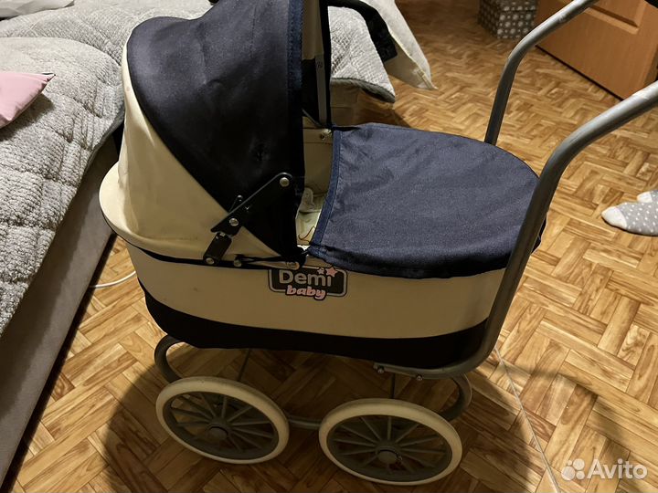 Игрушечная коляска для кукол