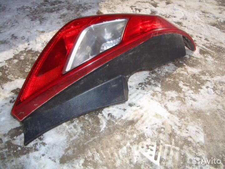 Фонарь левый Опель Корса D с06-15г