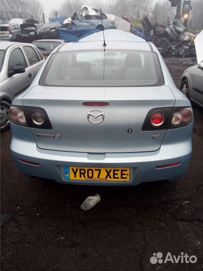 Суппорт тормозной передний правый mazda 3 1