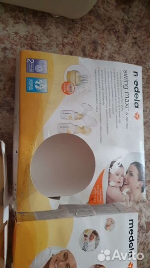 Молокоотсос medela swing maxi