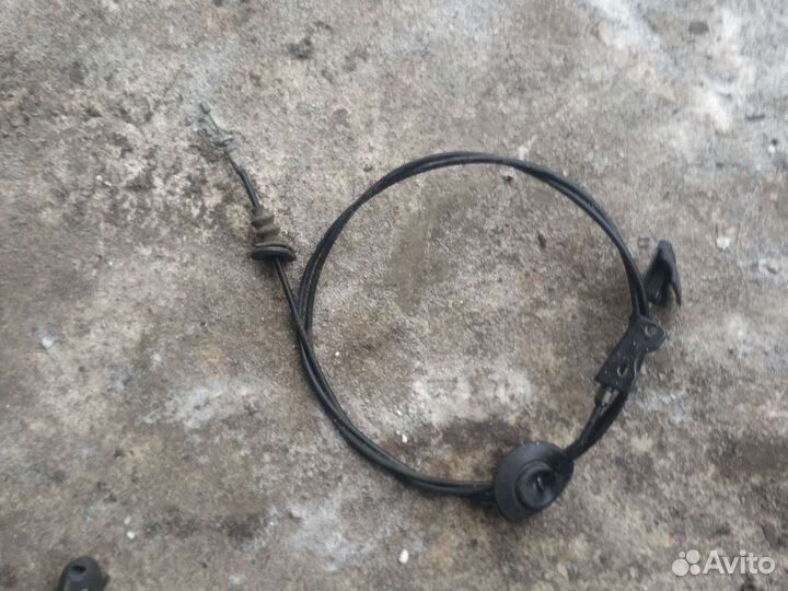 Тросик капота ниссан примера Р11