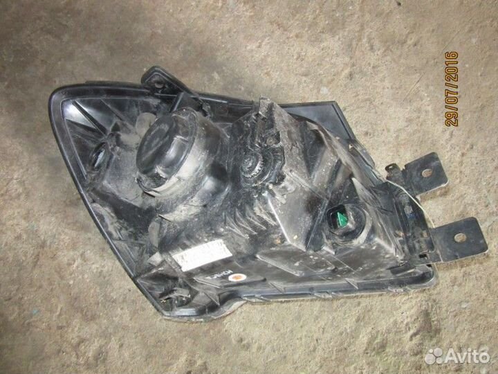 Фара левая Kia Sportage
