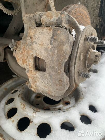 Суппорт правый левый Hyundai Lantra J1