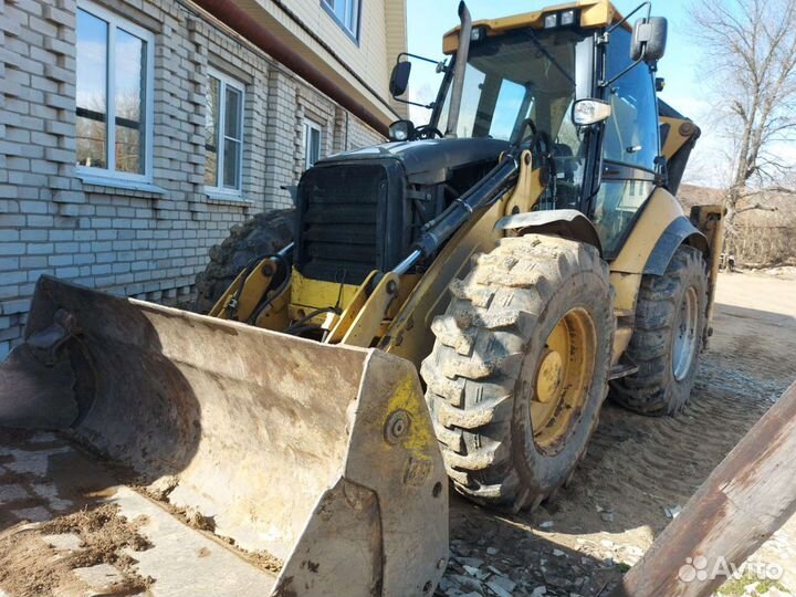 Эксковатор-погрузчик