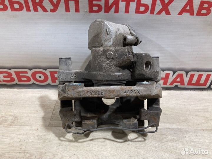 Суппорт тормозной задний левый Ford Focus 3