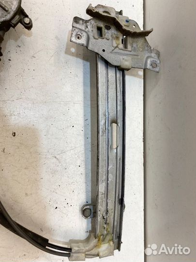 Мотор стеклоподъемника задний правый Kia Spectra