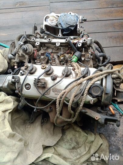 Двигатель f20a