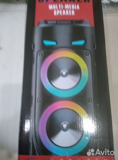 Караоке колонка блютузНовая микрофон и пульт