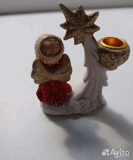 Статуэтка подсвечник