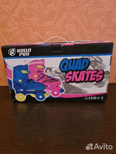 Роликовые коньки