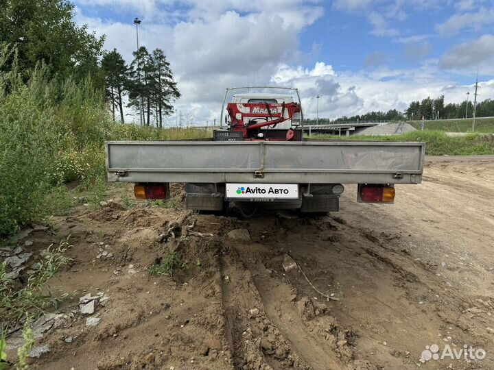 Бортовой грузовик Isuzu Elf, 2001