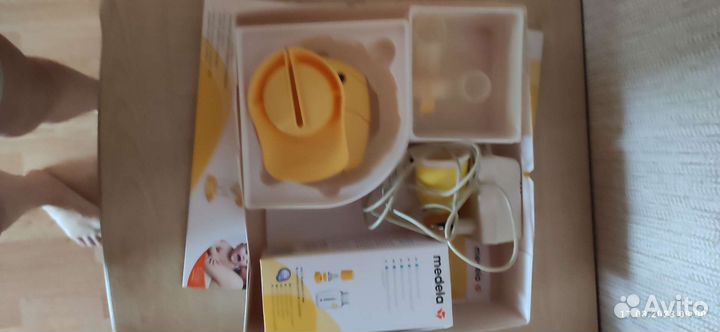 Молокоотсос medela