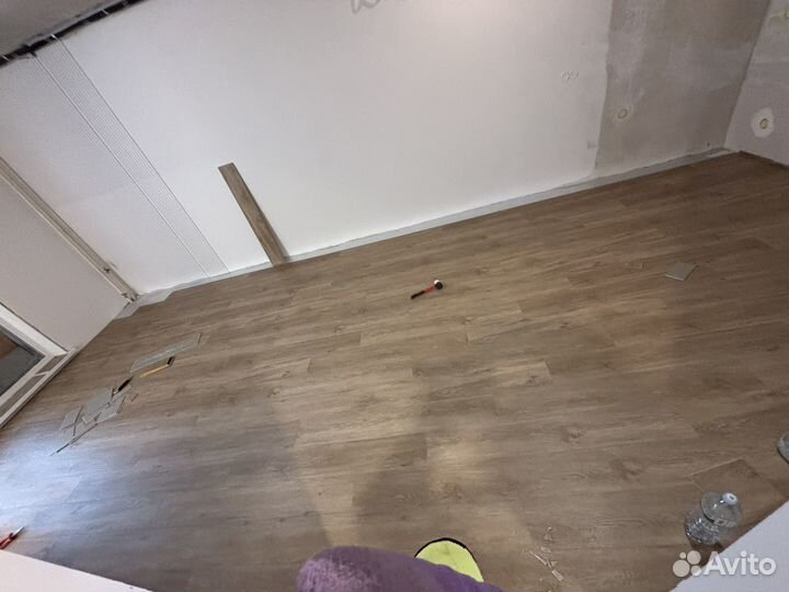 Укладка ламината и кварцвинила