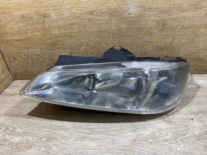 Фара передняя левая Peugeot 406 дорест 142333