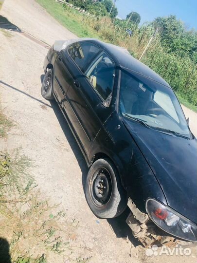 Nissan Sentra Almera 1,8AT 2000 разбор QG18