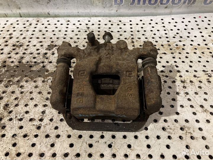 Суппорт задний левый Nissan Juke