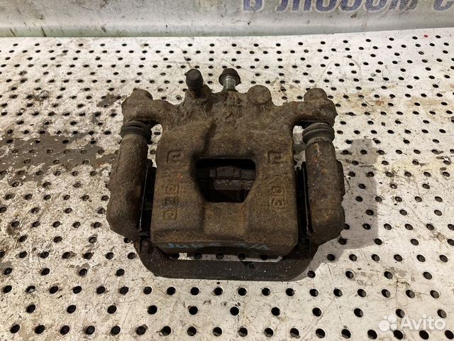 Суппорт задний левый Nissan Juke