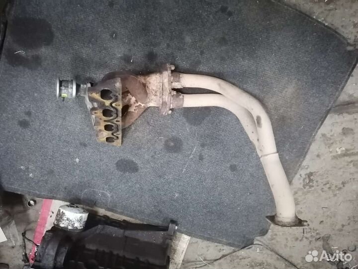 Коллектор выпускной x16xe Opel tigra a