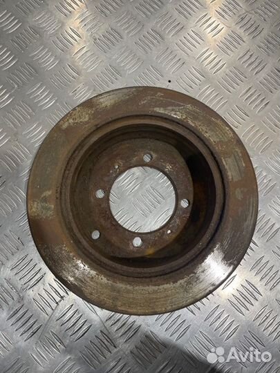 Тормозной диск задний Mitsubishi Lancer 9