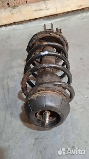 Стойка амортизатора передняя левая Chevrolet