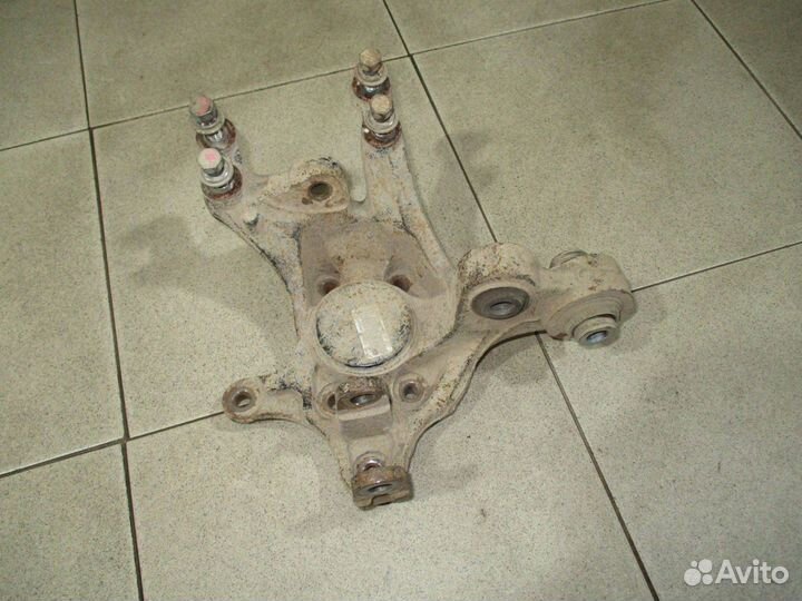 Кулак поворотный задний левый Kia Sportage 3 (SL)