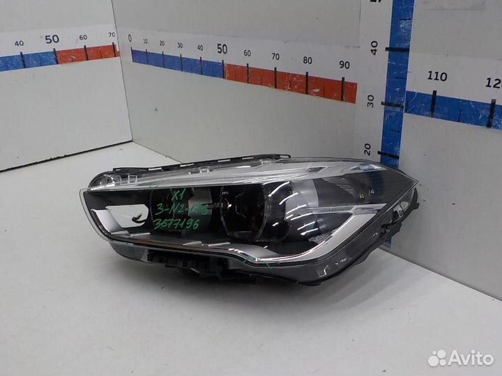Фара левая BMW X1