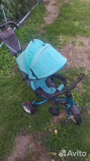 Трёхколёсный велосипед каталка