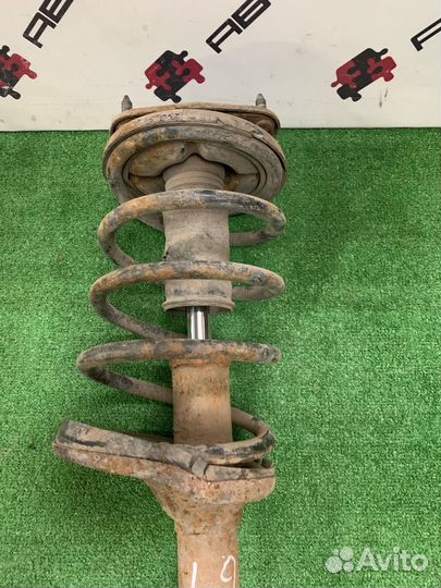 Амортизатор стойка лев прав Mitsubishi Lancer 9