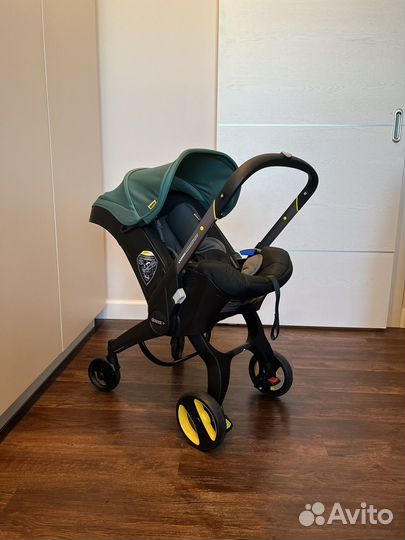 Коляска автокресло doona с базой isofix