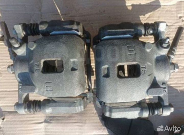 Сппорта тормозные передние пара Move La150S