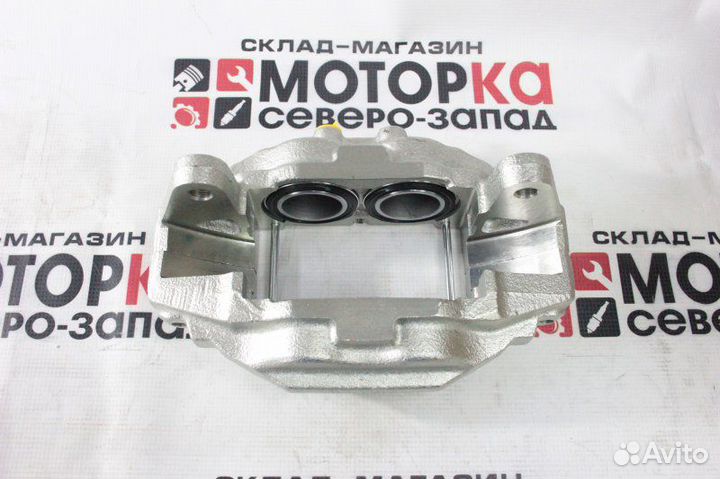 Суппорт тормозной передний правый Toyota Land