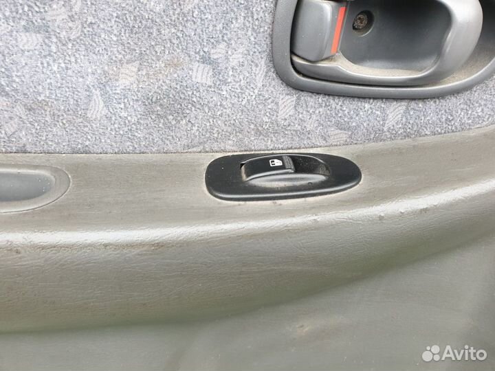 Обшивка двери задней левой Kia Spectra