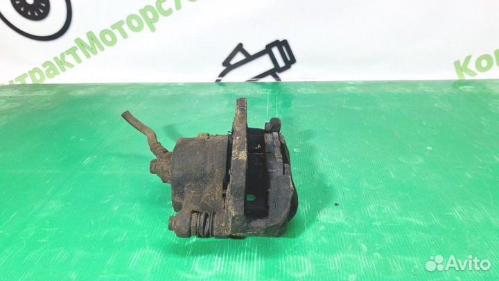 Суппорт тормозной передний правый Suzuki Liana