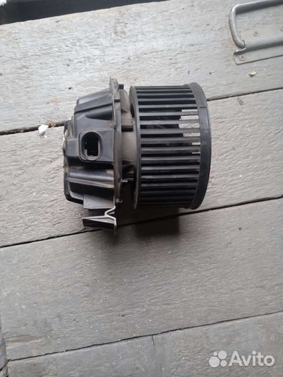 Моторчик отопителя печки на Рено Логан 1