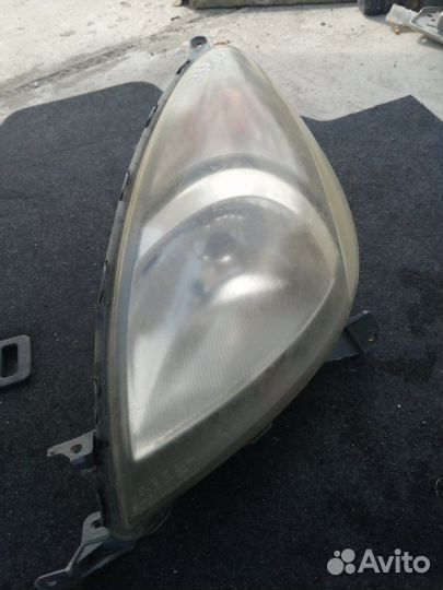Фара левая Toyota Funcargo NCP20