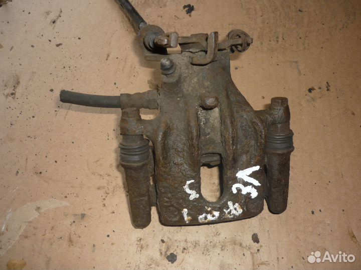 Суппорт задний левый Форд фокус 1