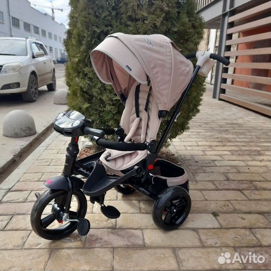 Трехколесный велосипед с ручкой