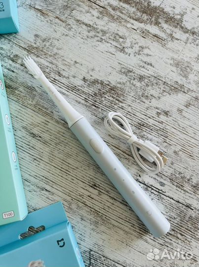 Электрическая зубная щетка новая