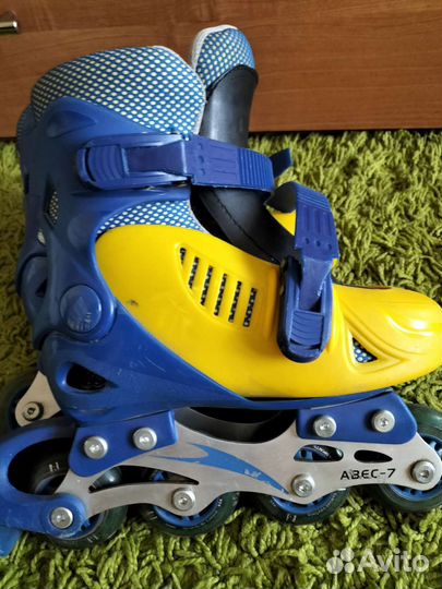 Роликовые коньки