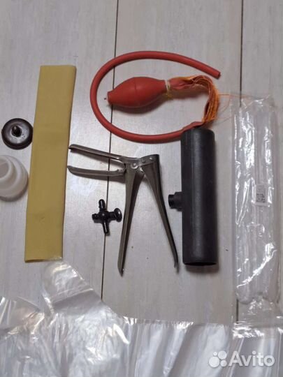 Набор для искусственного осеменения и дырокол