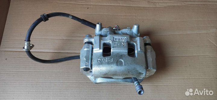 Суппорт передний Mitsubishi Pajero Sport 3