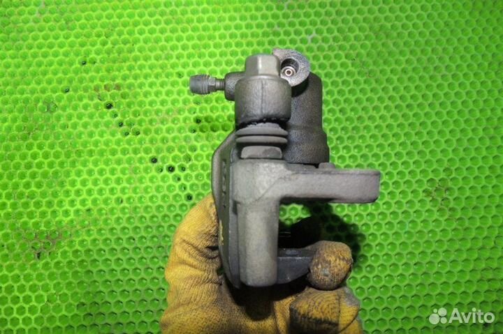 Суппорт тормозной задний правый Mitsubishi Lancer