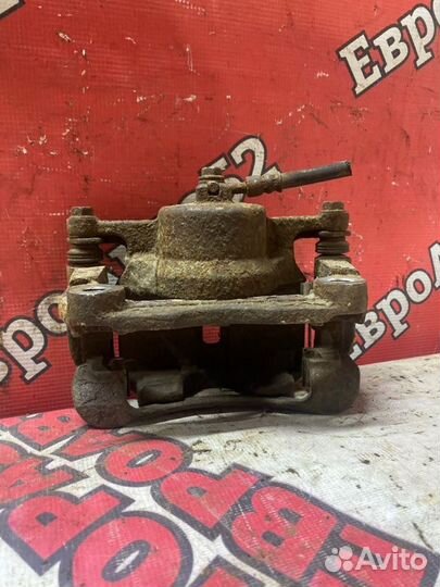 Суппорт тормозной передний правый Nissan X-Trail