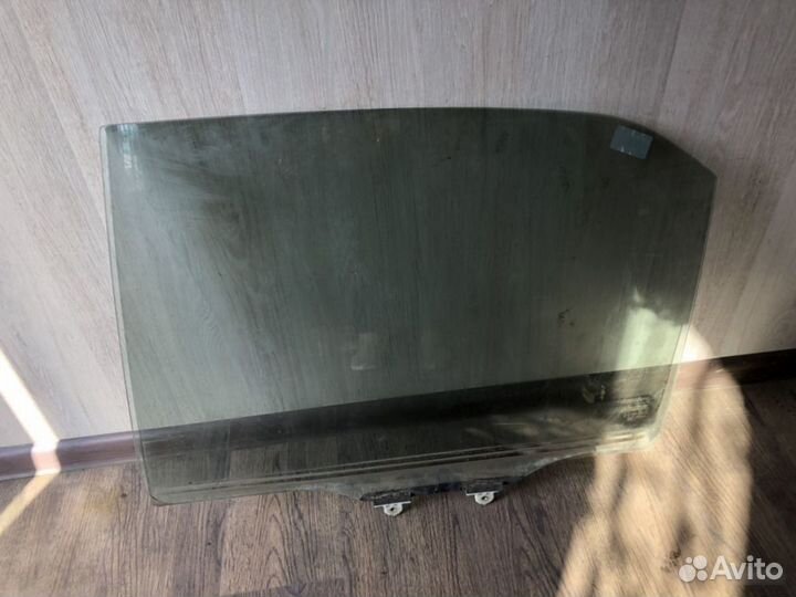 Стекло двери задней левой Mitsubishi Lancer