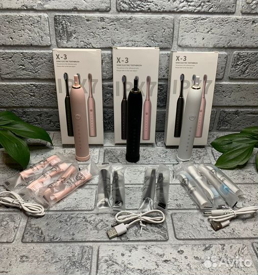 Электрическая зубная щетка