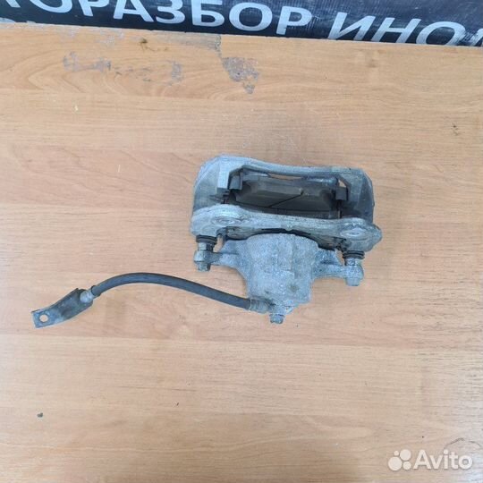 Суппорт тормозной передний правый Kia Seltos 1